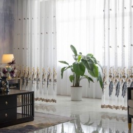 Riikinkukko-Kirjonta-Tylliv...